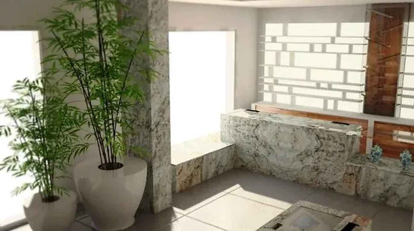 Obra de rehabilitación en ejecución con muro de bloque visto
