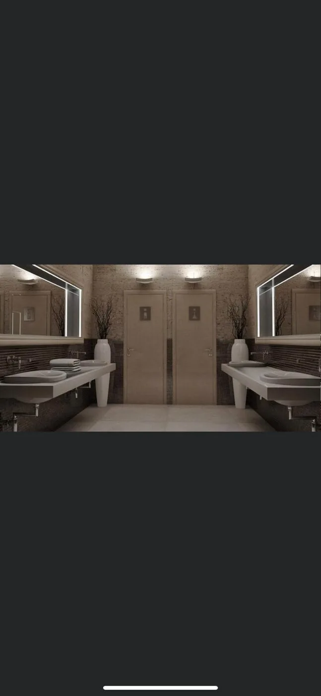 Baño con doble lavabo y diseño simétrico